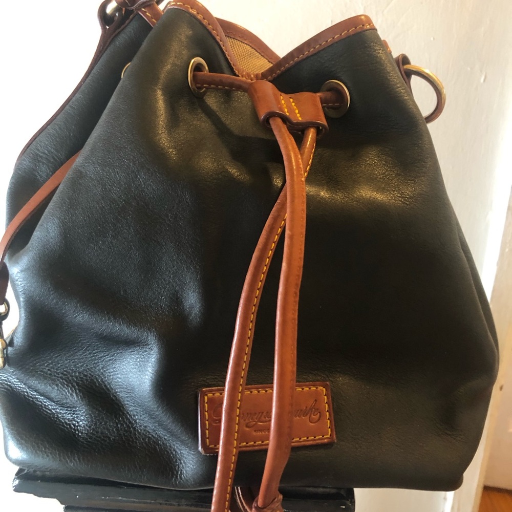 Dooney and Bourke Leather drawstring bag used 2x
